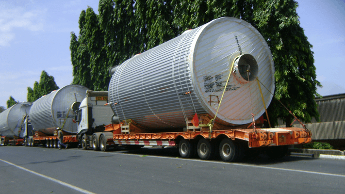 Oversized industrial equipment on a project cargo trailer
